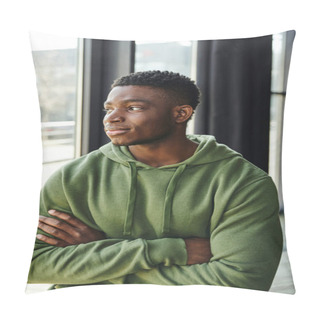 Personality  Pensive African American Businessman In Green Hoodie Standing With Folded Arms And Looking Away Near Window In Modern Office, Young Entrepreneur  Pillow Covers
