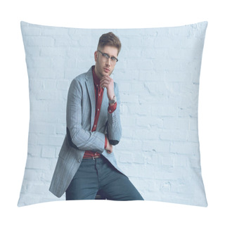 Personality  Handsome Young Man Wearing Suit And Glasses Sitting In Front Of Brick Wall Pillow Covers