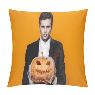 Personality  Photo Of Scary Dead Man On Halloween Wearing Classical Suit And Creepy Makeup Holding Carved Pumpkin Isolated Over Yellow Background Pillow Covers