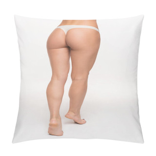 Personality  Partial View Of Young Woman In Beige Panties, Fit Buttocks And Legs Walking On Tiptoes On White Pillow Covers