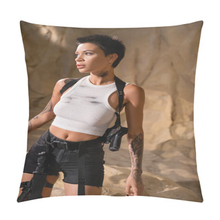 Personality  Tattooed Archaeologist In Dirty Outfit With Gun In Holster Looking Away In Cave Pillow Covers