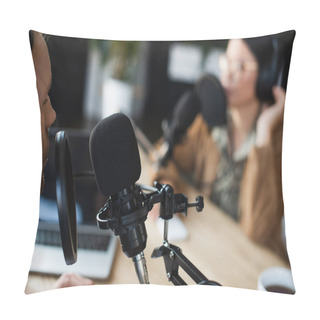 Personality  Radio Host In Wireless Headphones Talking In Microphone Near Blurred Asian Colleague  Pillow Covers