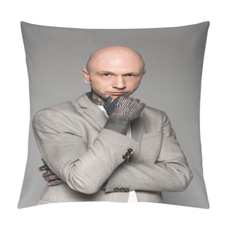 Personality  Confident Tattooed Man In Suit Jacket Standing With Hand On Chin And Looking At Camera Isolated On Grey Pillow Covers