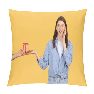 Personality  Surprised And Joyful Woman Receiving Small Gift Box With Red Ribbon, Expressing Excitement And Touching Cheek, Posing On Bright Yellow Background Pillow Covers