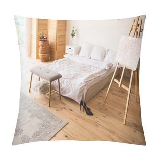 Personality  Bedroom With White Blanket And Pillows, Easel, Bedside Bench, Carpet, Room Devider And Black Heels On Wooden Floor Pillow Covers