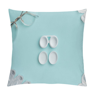 Personality  Top View Of Eyeglasses And Arranged Contact Lenses Containers On Blue Background Pillow Covers