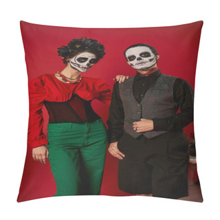 Personality  Elegant Couple In Dia De Los Muertos Makeup And Festive Attire Looking At Camera Near Flowers On Red Pillow Covers