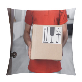 Personality  Cropped View Of Courier Holding Carton Box With Symbols In Hallway  Pillow Covers