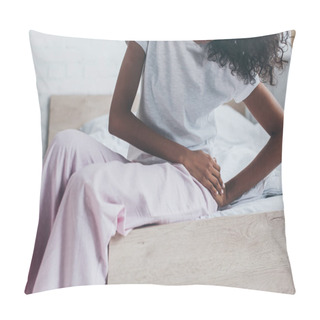Personality  Cropped View Of African American Woman Suffering From Pain In Hip While Sitting On Bed Pillow Covers