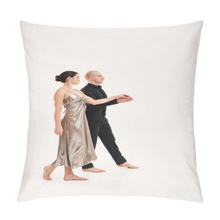 Personality  A Young Man In Black And A Young Woman In A Silver Dress Dance Together In A Studio Shot On A White Background. Pillow Covers
