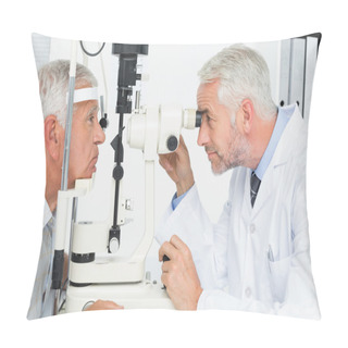 Personality  Optometrist Doing Sight Testing For Senior Patient Pillow Covers
