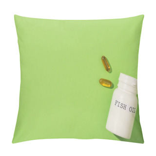 Personality  Top View Of Container With Fish Oil Lettering And Capsules On Green  Pillow Covers