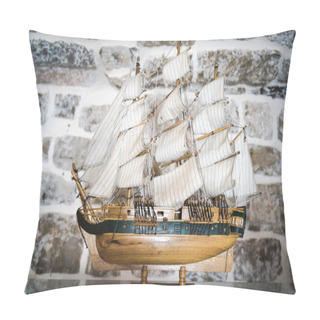 Personality  BUDVA, MONTENEGRO - SEPTEMBER 5, 2015: Wooden Replica Of The Old Vessel Sailfish As Ship Model In A Stone Room Inside The Old Town. Pillow Covers