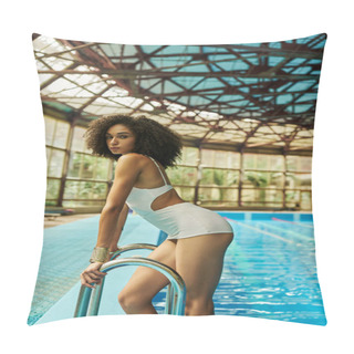 Personality  Young And Curly African American Woman In Bathing Suit Standing By Pool Ladder With Blue Water Pillow Covers