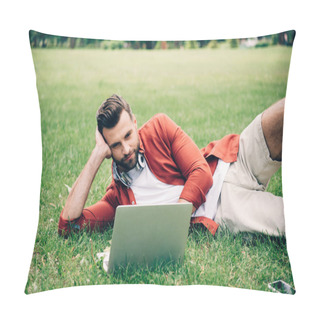 Personality  Young Man Lying On Grass In Park And Using Laptop Pillow Covers
