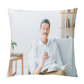 Personality  Happy Senior Man Holding Book And Glasses At Home Pillow Covers