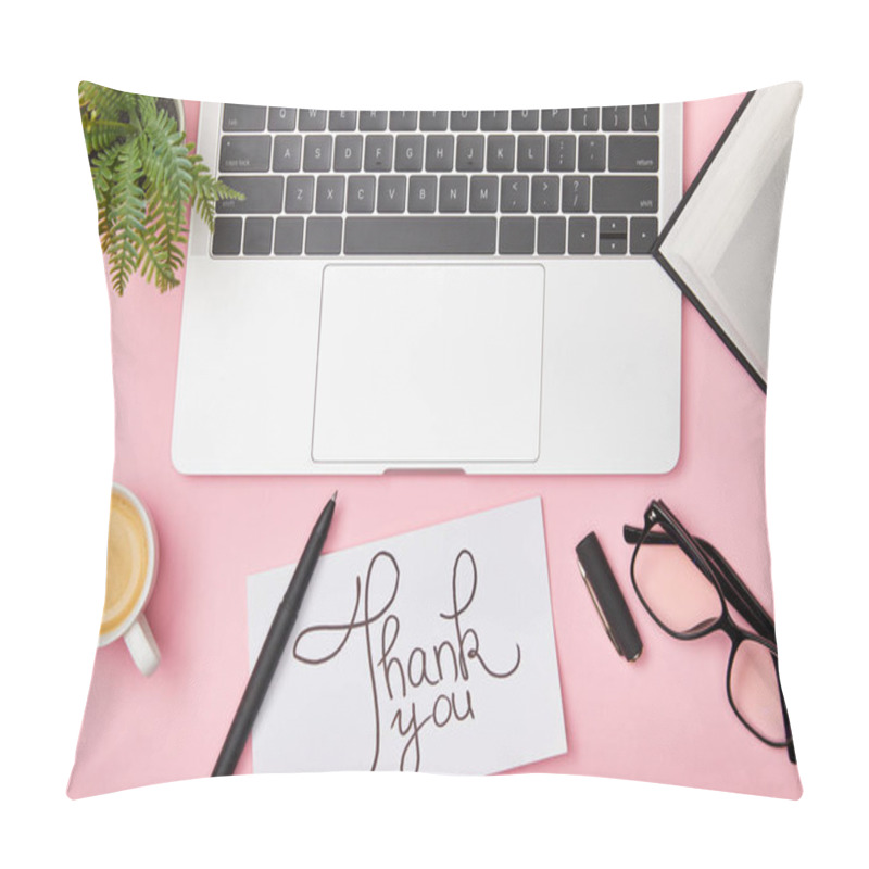 Personality  top view of laptop, green plant, coffee, notebook, glasses and card with thank you lettering at workplace on pink background pillow covers