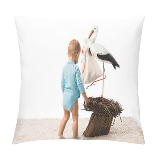 Personality  Cute Toddler Boy In Blue Bodysuit Standing On Carpet And Looking At Big Decorative Stork Isolated On White Pillow Covers