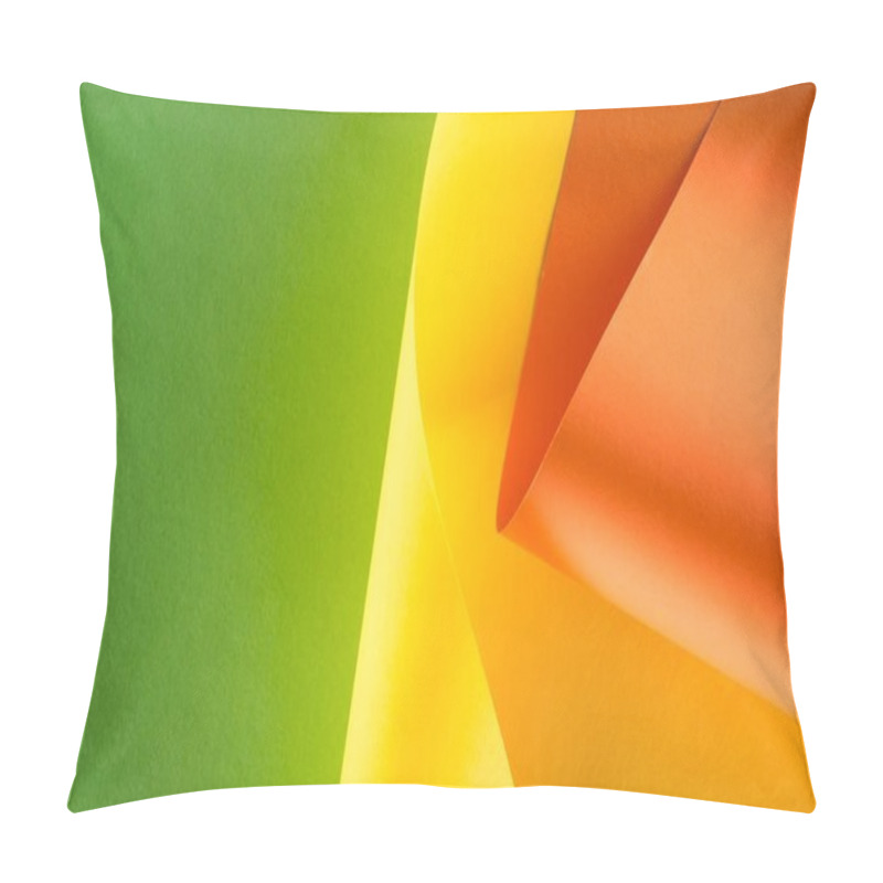 Personality  Close-up Shot Of Rolled Yellow And Orange Papers On Green Background Pillow Covers