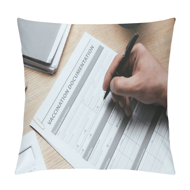 Personality  cropped view of man filling in Vaccination Documentation Medical Concept pillow covers