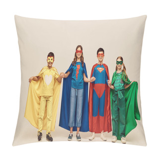 Personality  Happy Interracial Preteen Kids In Colorful Superhero Costumes With Cloaks And Masks Holding Hands And Looking At Camera While Celebrating Child Protection Day Holiday On Grey Background In Studio  Pillow Covers
