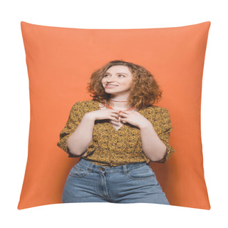 Personality  Positive Red Haired Model In Casual Blouse And Jeans Touching Necklaces And Looking Away While Standing On Orange Background, Stylish Casual Outfit And Summer Vibes Concept, Youth Culture Pillow Covers