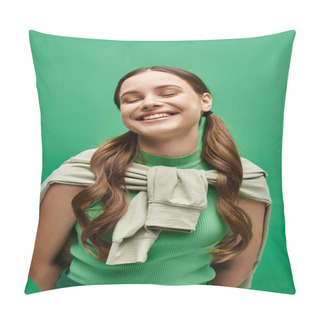 Personality  A Happy Young Woman In Her Twenties With Long Hair Gracefully Poses In A Green Sweater In A Studio Setting. Pillow Covers