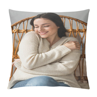 Personality  Smiling Woman In Cozy Sweater Hugging Herself In Wicker Chair Pillow Covers