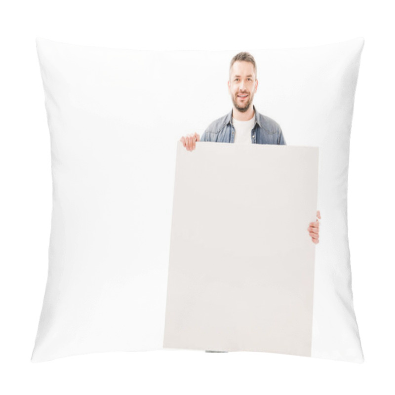 Personality  front view of smiling bearded man holding blank placard isolated on white pillow covers