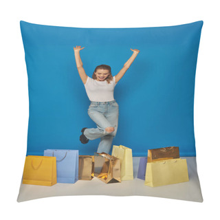 Personality  Woman Feeling Joy From Shopping, Standing With Raised Hands Near Shopping Bags On Blue Background Pillow Covers