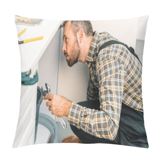 Personality  Side View Of Handsome Plumber Holding Adjustable Wrench And Looking Under Broken Sink In Kitchen Pillow Covers