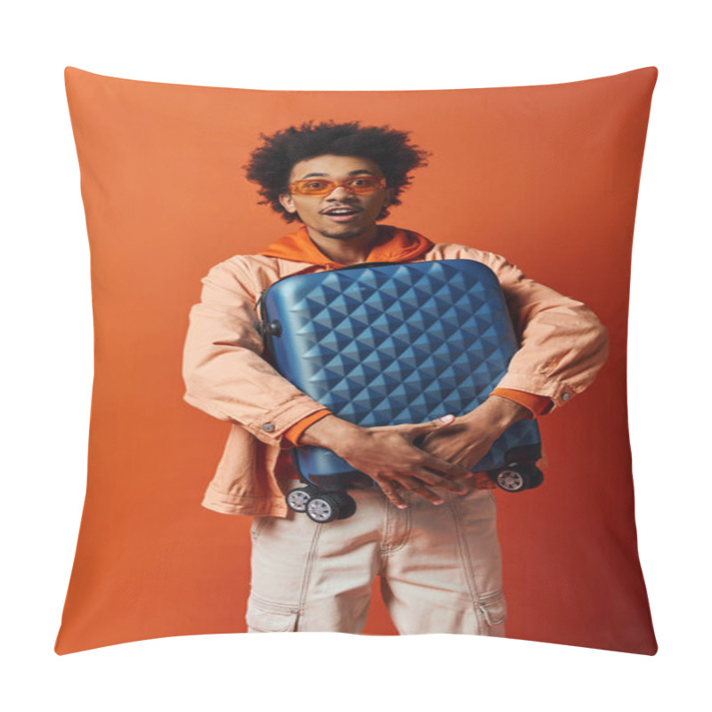 Personality  Stylish African American Man In Trendy Attire And Sunglasses Holding A Blue Piece Of Luggage On An Orange Background. Pillow Covers