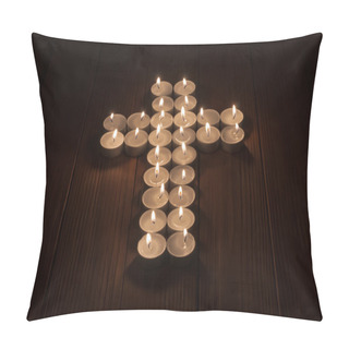 Personality  Lit Tea Lights In The Shape Of A Cross On  Wooden Surface. Pillow Covers
