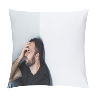 Personality  Depressed Man Sitting In Corner With Closed Eyes And Holding Hand On Forehead Pillow Covers