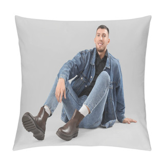 Personality  Stylish Young Man In Denim Clothes Sitting On Light Background Pillow Covers