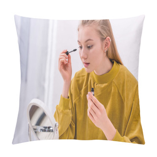 Personality  Young Woman Applying Mascara And Looking At Mirror Pillow Covers