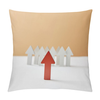 Personality  Selective Focus Of Red Arrow Figures With White Pointing On Table And Beige Background Pillow Covers