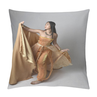 Personality  Full Length Portrait Of Pretty Young Asian Woman Wearing Golden Arabian Robes Like A Genie, Standing Pose Holding Flowing Fabric, Isolated On Studio Background. Pillow Covers
