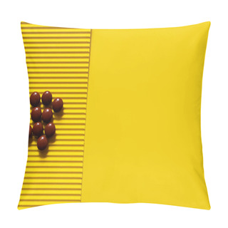 Personality  Top View Of Pile With Brown Round Shape Pills On Yellow Textured Background  Pillow Covers