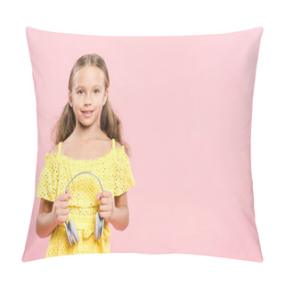 Personality  Smiling And Cute Kid Holding Headphones Isolated On Pink Pillow Covers