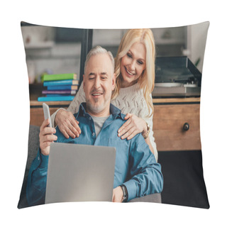 Personality  Blonde Woman Hugging Smiling Husband Looking At Laptop While Holding Smartphone Pillow Covers