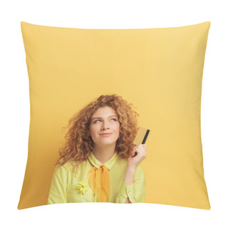 Personality  Smiling Redhead Woman Holding Credit Card While Thinking On Yellow  Pillow Covers