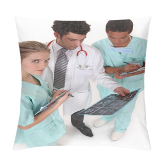 Personality  A Team Of Medical Professionals Discussing The Results Of A Patient's Pillow Covers