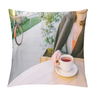 Personality  Female Hand Holding Tea Cup Over Wooden Table Outdoors Pillow Covers
