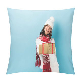Personality  Young Pleased Woman In Winter Outfit Holding Wrapped Present On Blue Pillow Covers