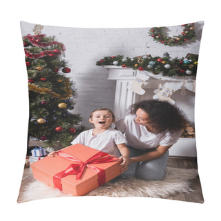 Personality  Girl With Open Mouth Holding Big Gift Box Near Mother And Festive Pine At Home Pillow Covers