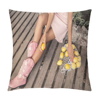 Personality  Top View Of Trendy Young African American Woman In Summer Dress And Boots Holding Fresh Lemon Near Mesh Bag And Sitting In Garden Center, Chic Woman In Tropical Garden, Summer Concept Pillow Covers