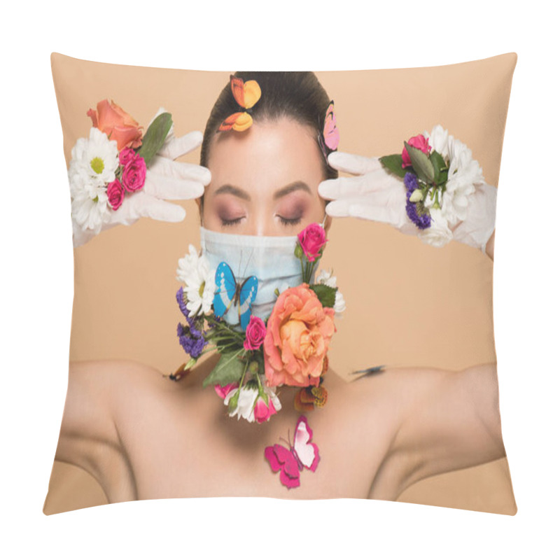 Personality  attractive asian woman with closed eyes in latex gloves and floral face mask with butterflies isolated on beige pillow covers