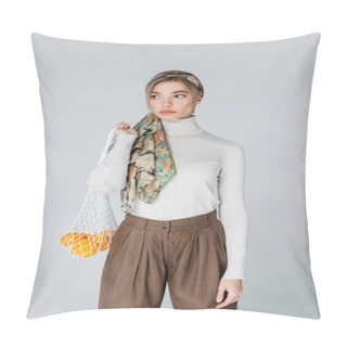 Personality  Woman In White Turtleneck And Headscarf Holding Net Bag With Ripe Oranges Isolated On Grey Pillow Covers