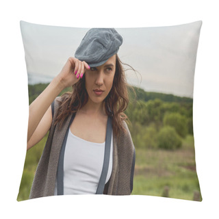 Personality  Fashionable Brunette Woman In Suspenders And Vintage Clothes Wearing Newsboy Cap And Looking Away While Standing With Blurred Nature At Background, Fashion-forward In Countryside Pillow Covers